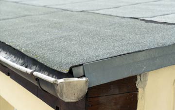 repair or replace Woodrising flat roofing?