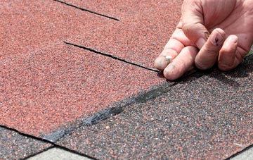 Woodrising asphalt roof repairs